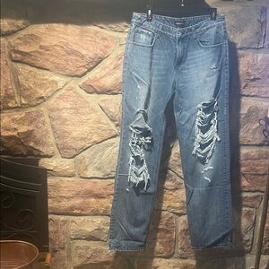 Retrofete size 30 Distressed Blue Jeans in great condition. Inseam 33”